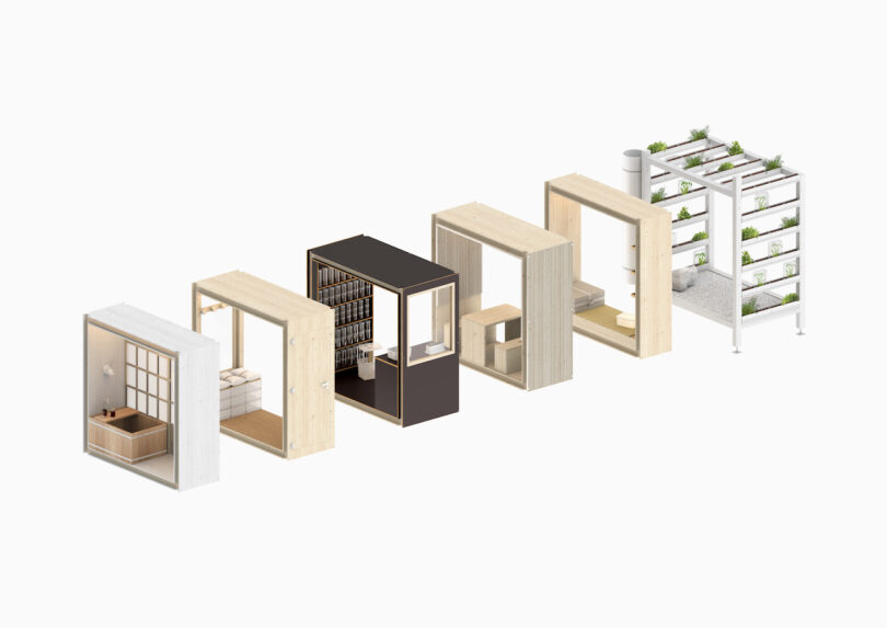 A row of modular wooden and metal room units displaying different interior functions