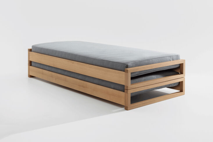Two high-end solid wood Zeitraum Guest Stacking Beds stacked neatly.