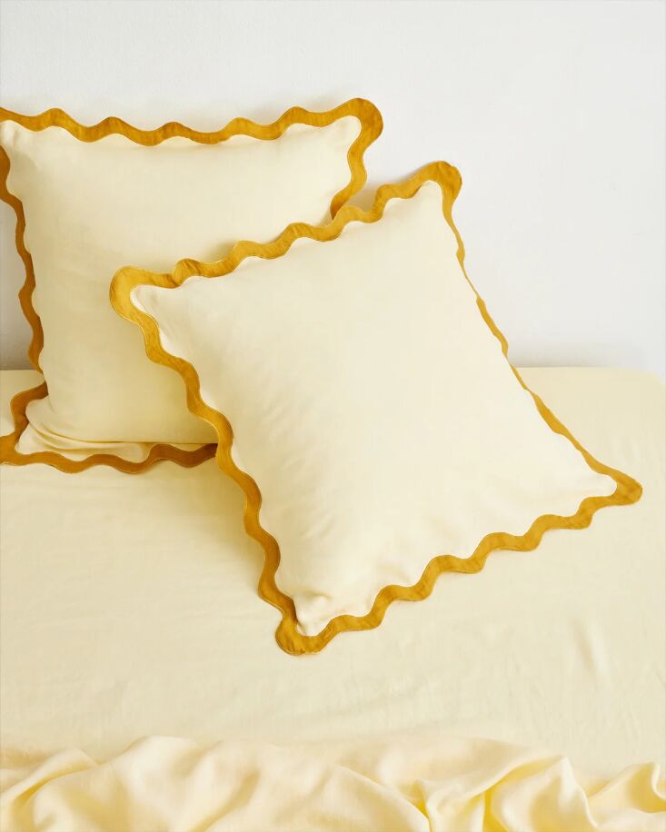 Scalloped European Pillowcases in bright Limoncello and Turmeric colors.
