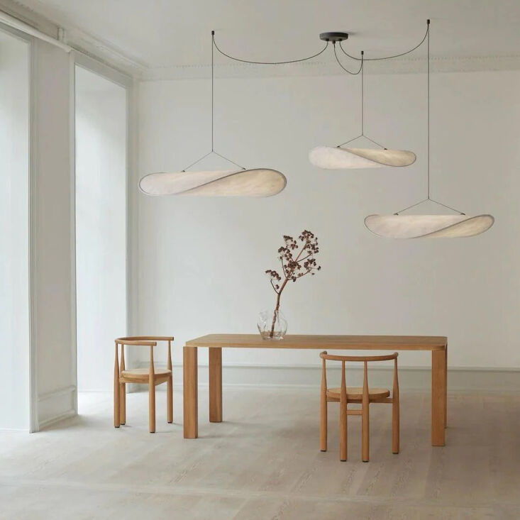 A white cloud-like pendant lamp made of Tyvek material.