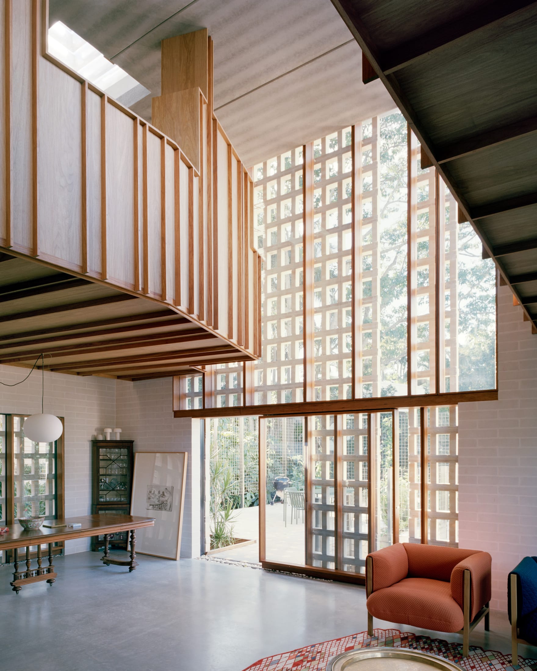 The tall brick brise soleil of Birdwood House casting deep shadows across the facade.
