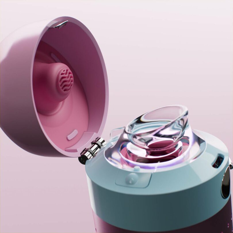 Macro shot of a pink and white bottle lid mechanism showing detailed hinge and transparent components.