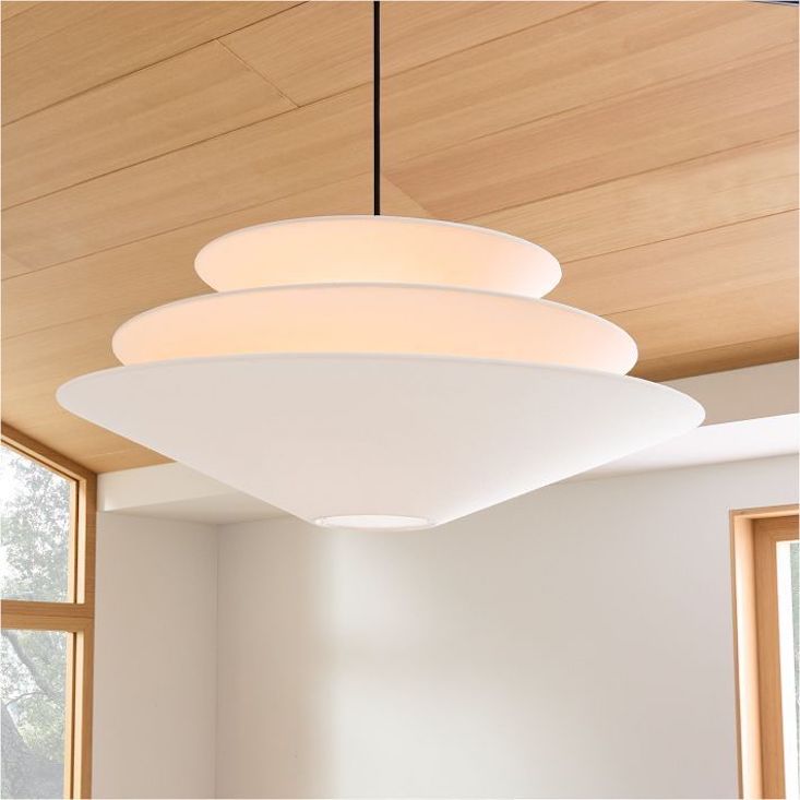 Close-up of the West Elm Gull Pendant's white linen shade and internal metal frame.
