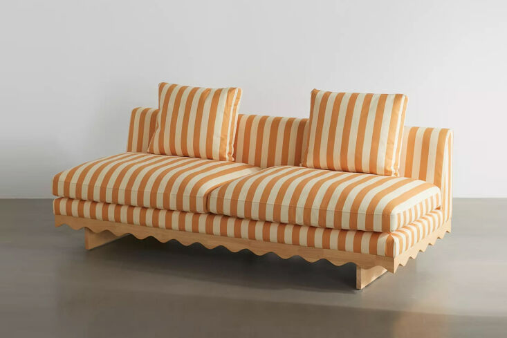Urban Outfitters Roma Sofa featuring thick red and white vertical stripes.