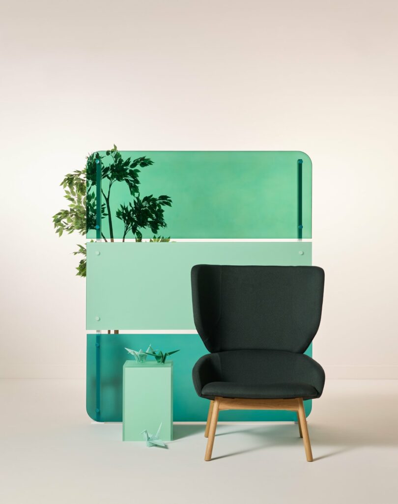 Teal and green translucent resin panels layered to create a sense of natural harmony.