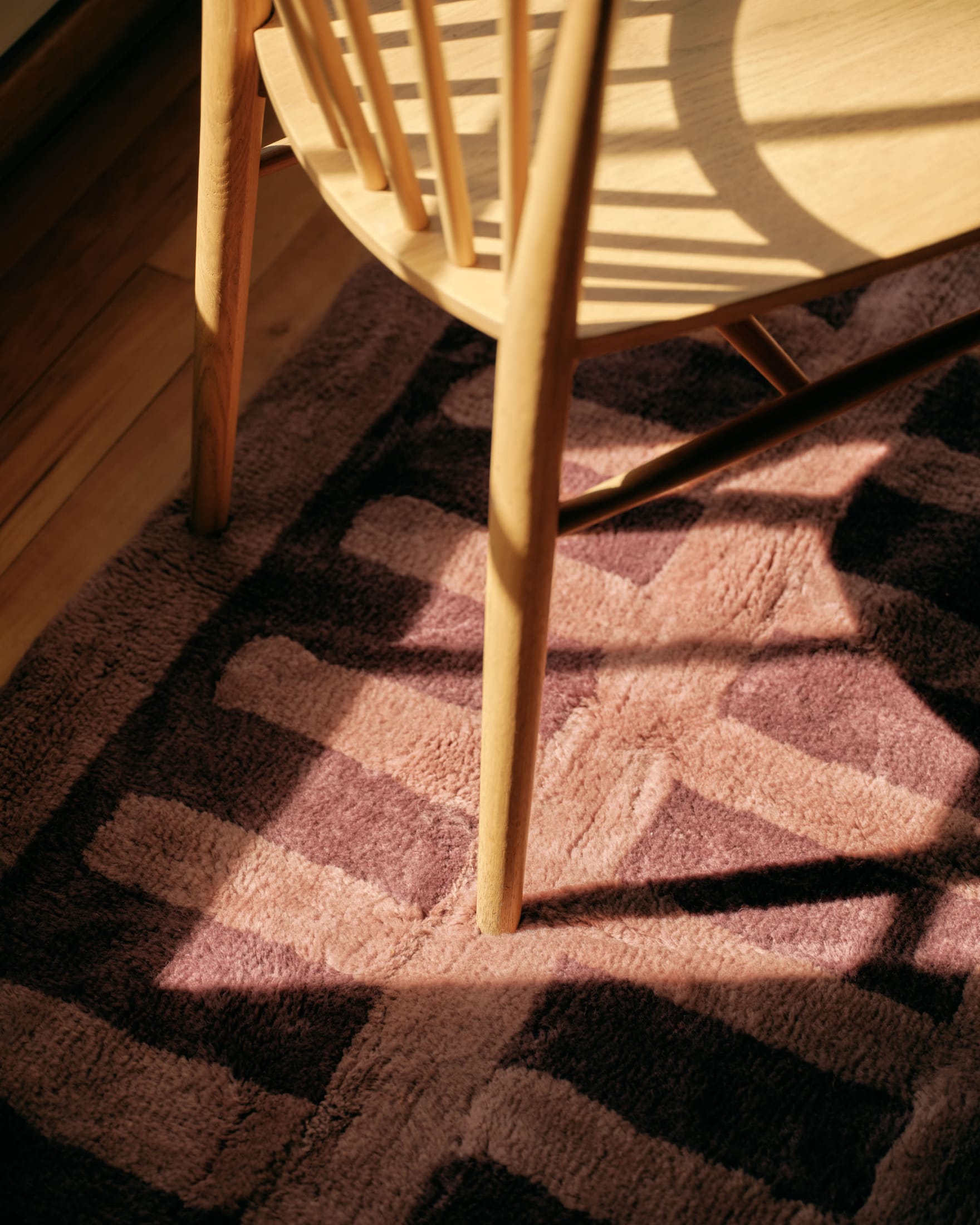 Close-up of the Tasman Brown rug showing vertical textured lines.