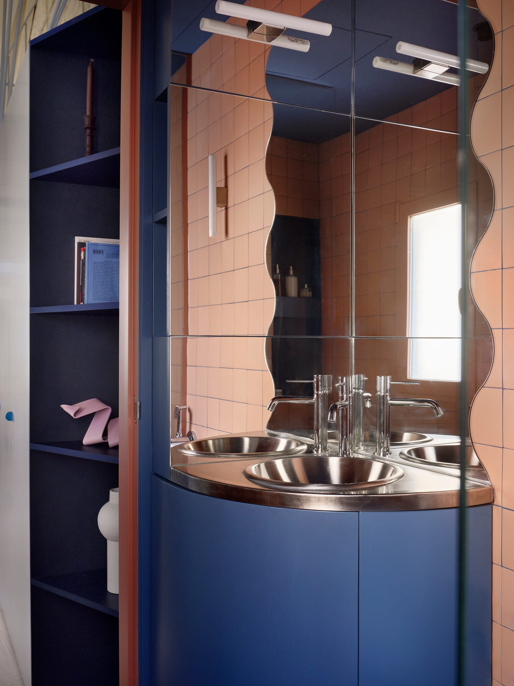 Glass brick wall detail filtering natural light into the interior.