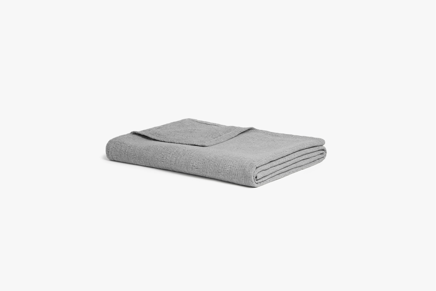 Grey and black minimalist cotton coverlet with a modern boxed pattern.