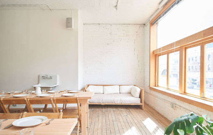 A wood daybed in a dining loft on Canal Street, NYC.