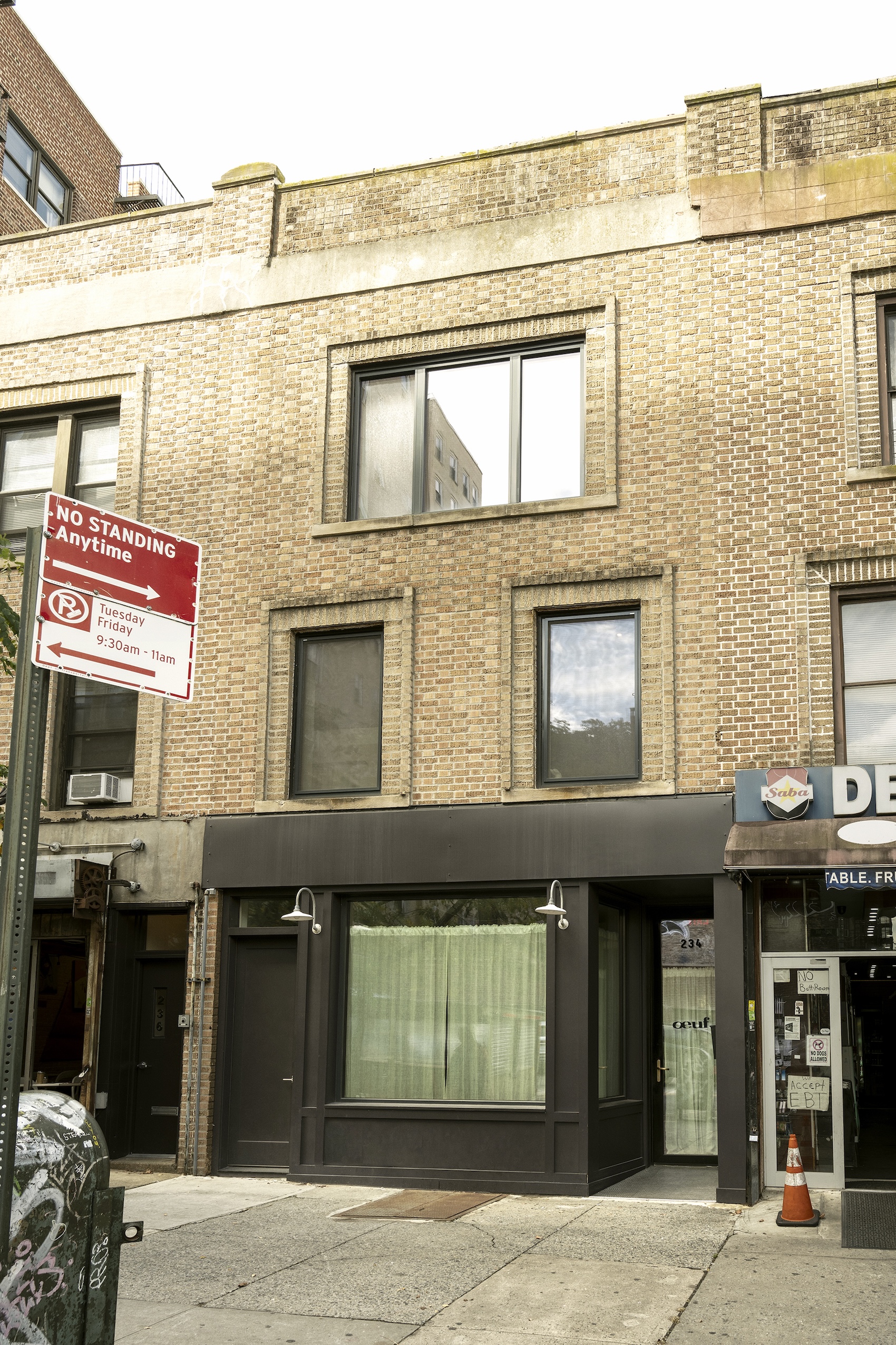 Exterior view of the three-story 1920s brick building in Prospect Heights.