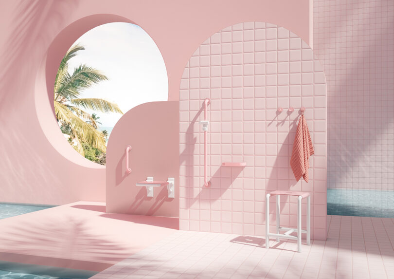 Minimalist pink-tiled bathroom featuring accessibility grab bars and a round window with a palm tree view.