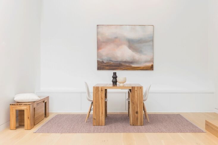 A partially extended Transformer Table and bench set up for a small daily dining area.