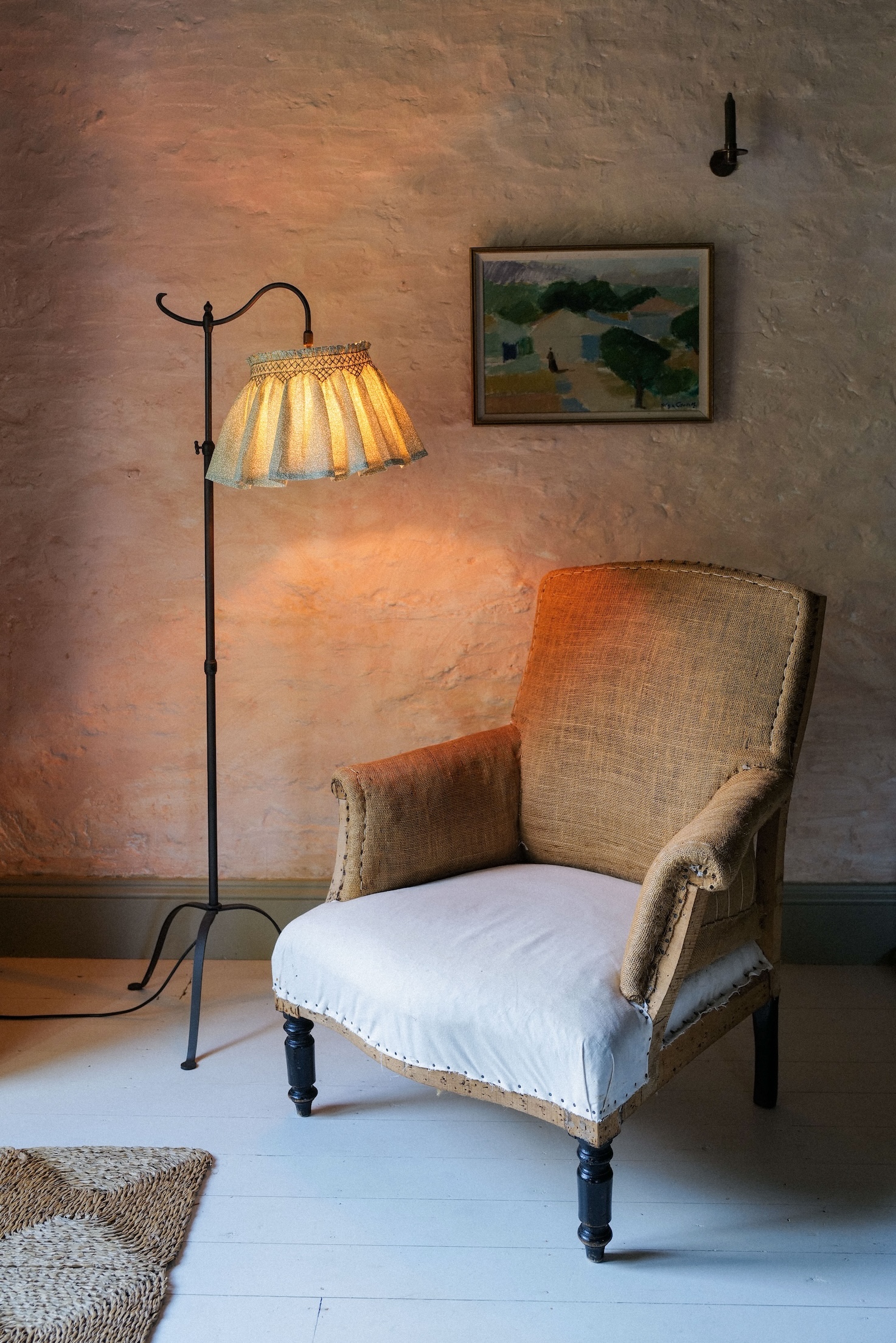 A maxi-sized floral smocked skirt lampshade with a visible petticoat base structure.