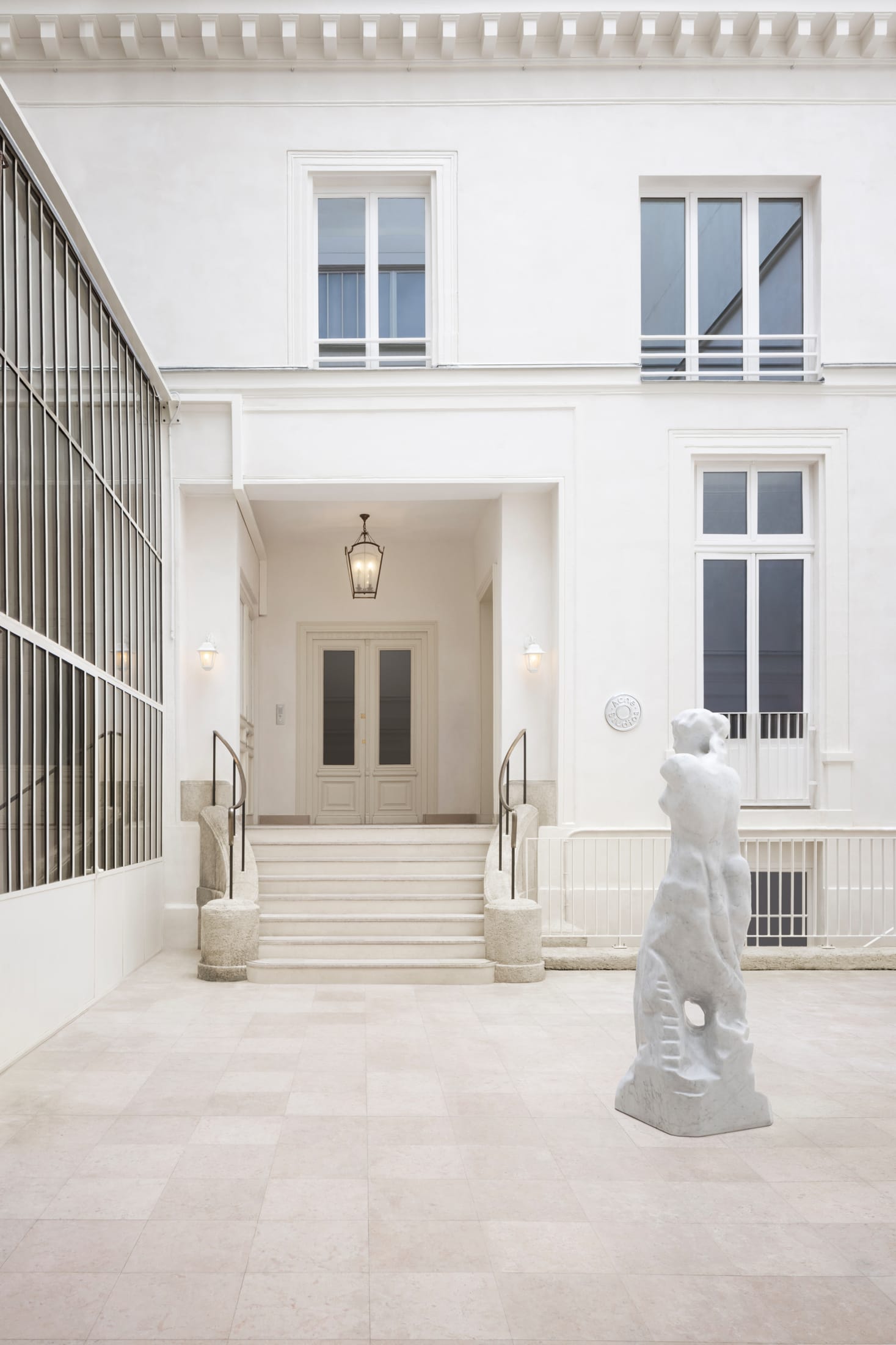 Communal area or kitchen space within the Acne Studios office designed for staff interaction.