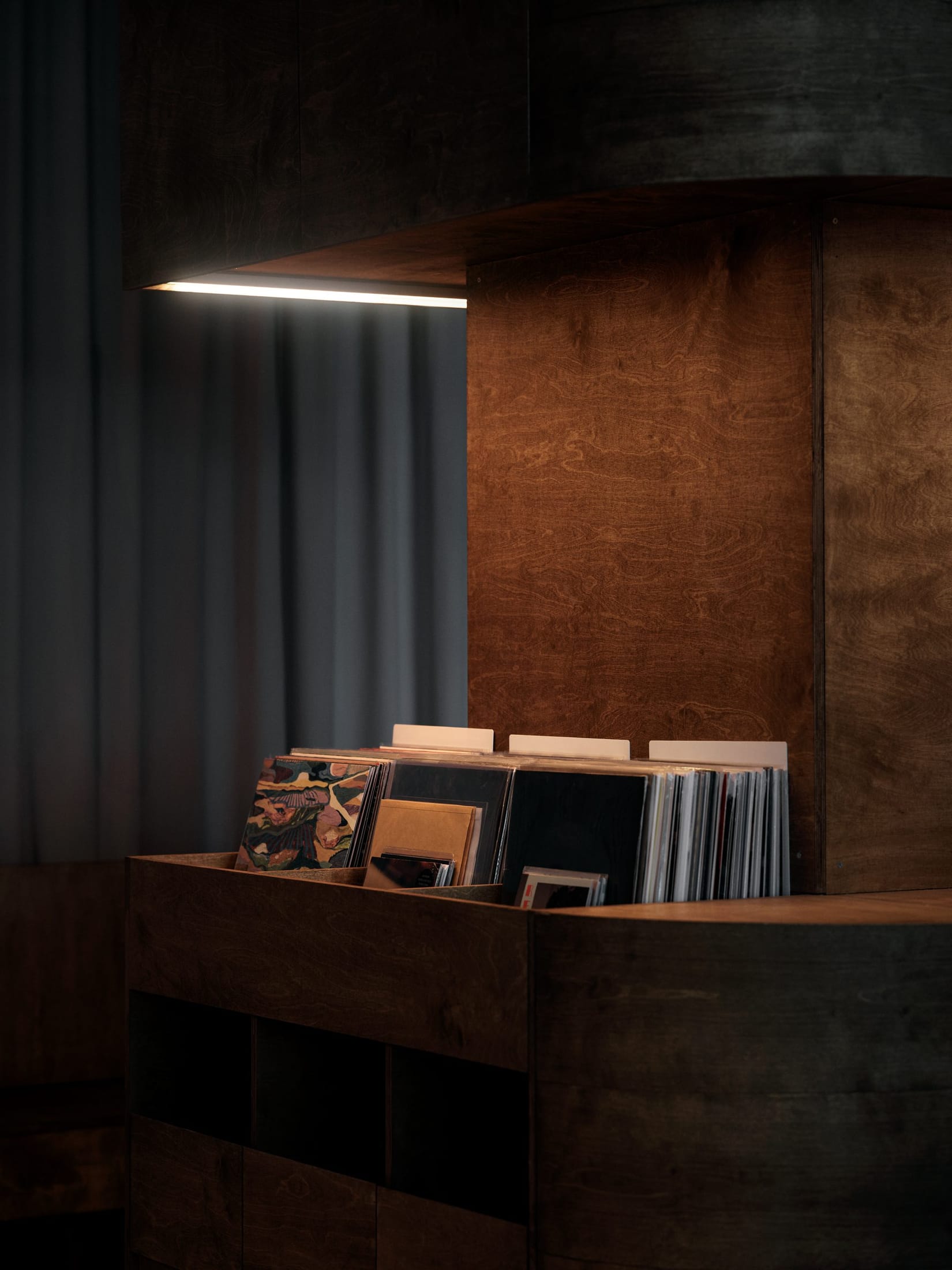 Detail of the oiled birch plywood frame and the 'room within a room' timber construction.