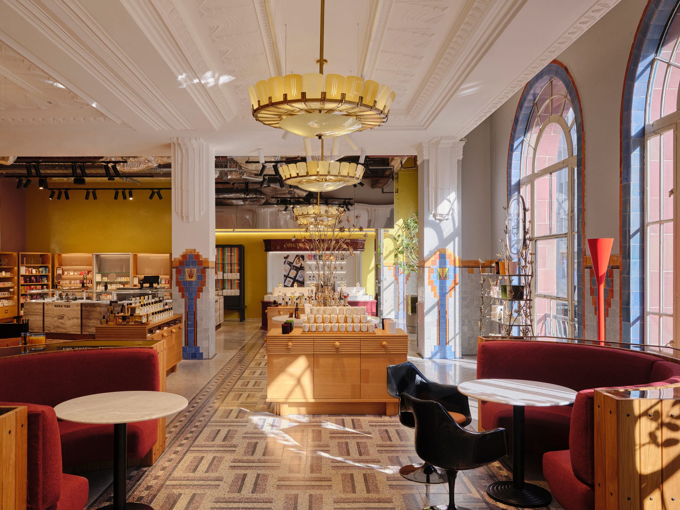 Interior view showing the tall columns and heritage architectural framework of the 1930s building.
