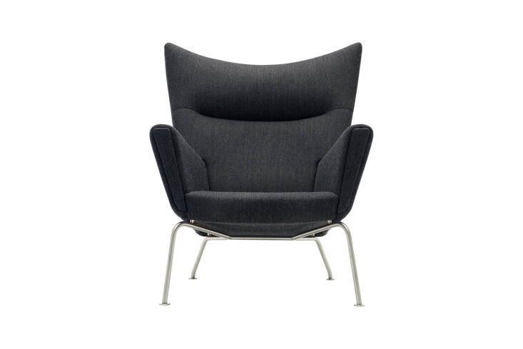 Hans Wegner designed CH445 Wing Chair with stainless steel legs and distinctive cornered wings.