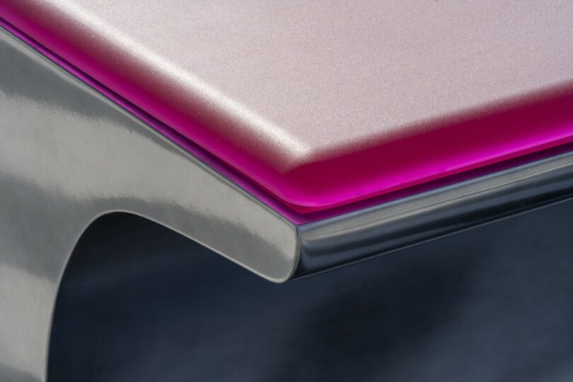 Close-up detail of a translucent, pigmented silicone cushion on a piece of outdoor furniture.