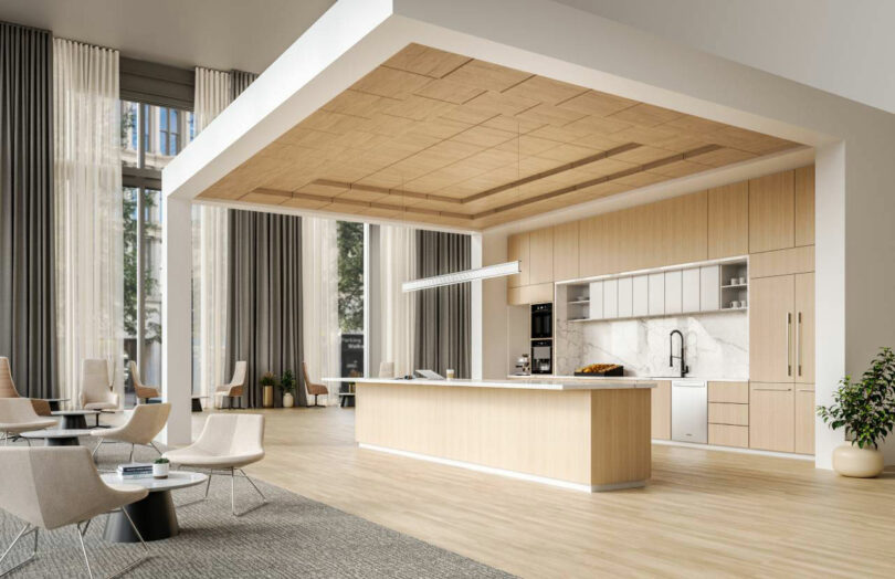 Modern kitchen and residential lounge with high ceilings and light wood accents.