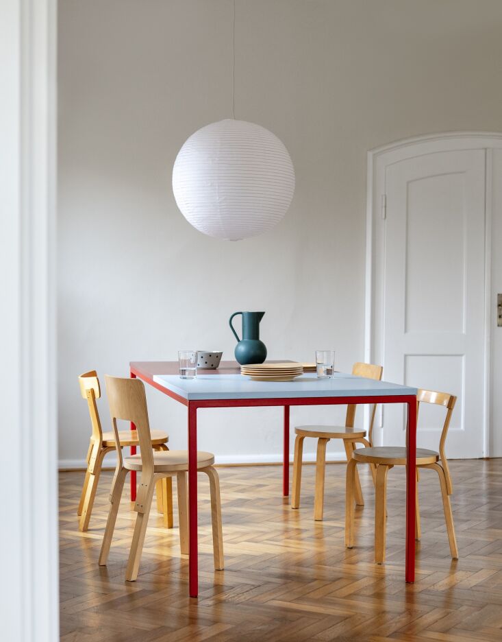 Friis table paired with multiple Alvar Aalto Artek chairs (Chair 66, 68, and 69).
