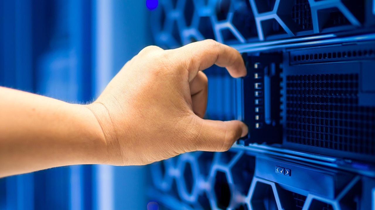 A dishwasher's top third rack filled with cutlery and small utensils