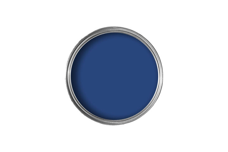 A detail shot of electric Smalt blue paint applied to bedroom wall trim.