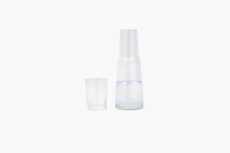 Modern geometric glass carafe with a unique stacked silhouette.