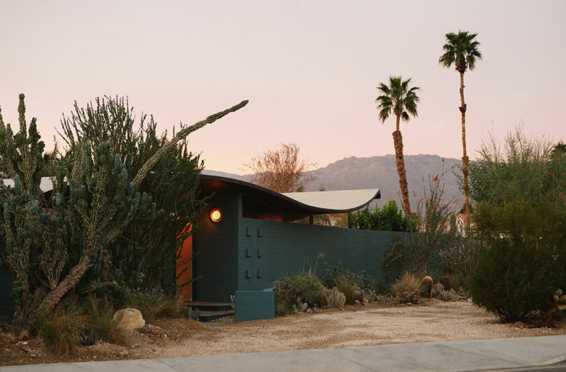 The Wave House at sunset with a backdrop of the San Jacinto Mountains.