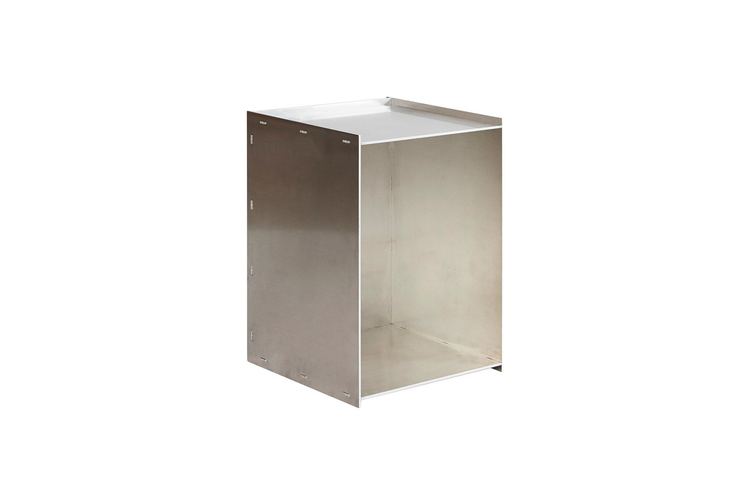 Frama Rivet Box Table made of raw aluminum in a minimalist room.