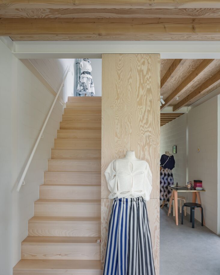 Artist Eva Maria Bogaert in her studio duplex within the modular house.