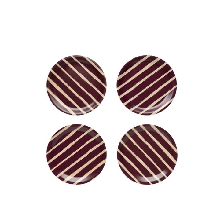 A set of Marimekko Piccolo coasters with thin colorful stripes.