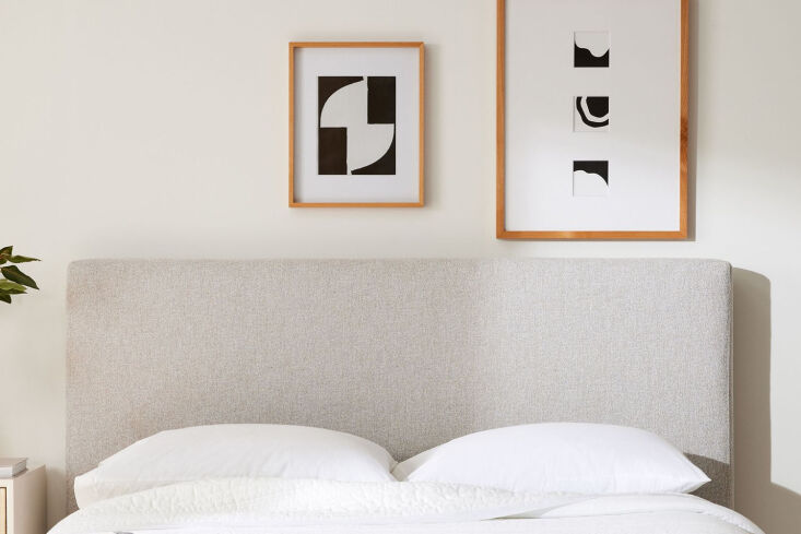 The Emmet Non-Tufted Headboard with a simple rectangular silhouette and grey upholstery.
