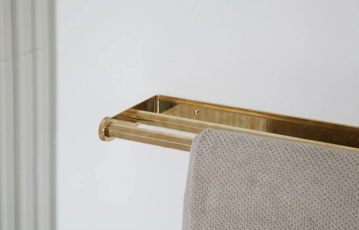 A luxury brass double towel bar from the Heritage collection.