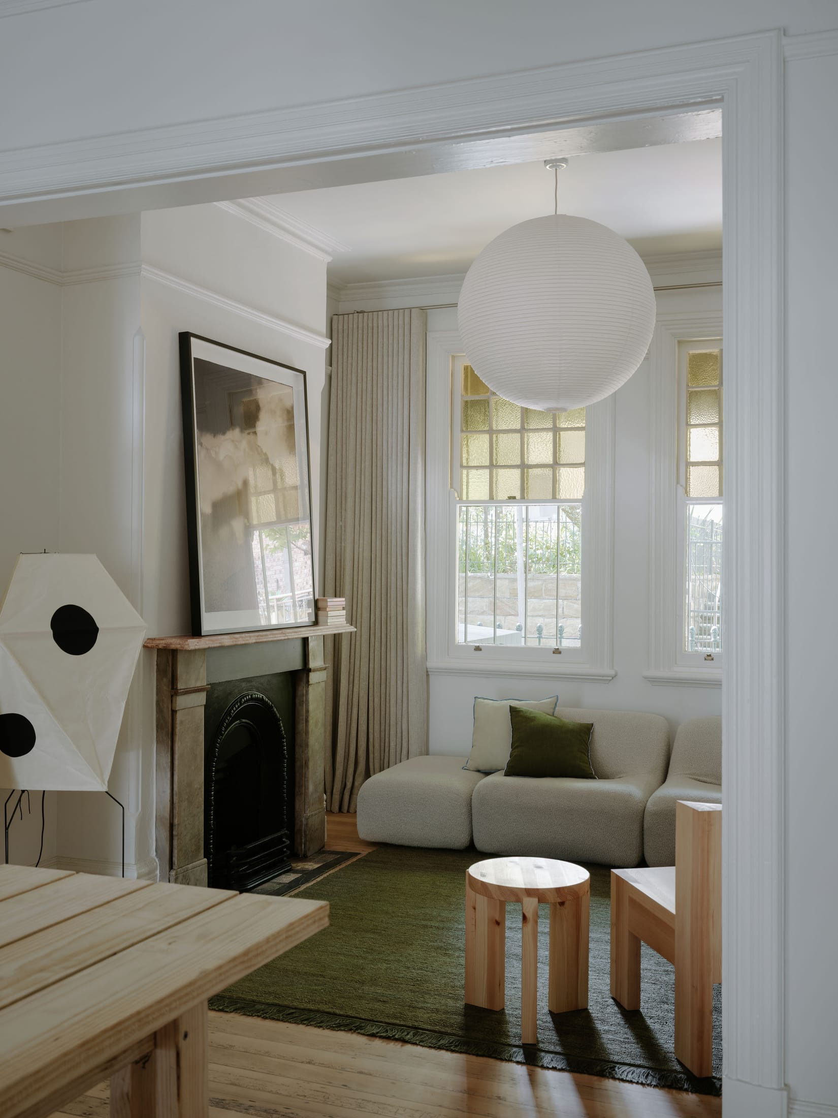 Wide exterior view of a renovated Sydney terrace house with galvanised steel facade elements.
