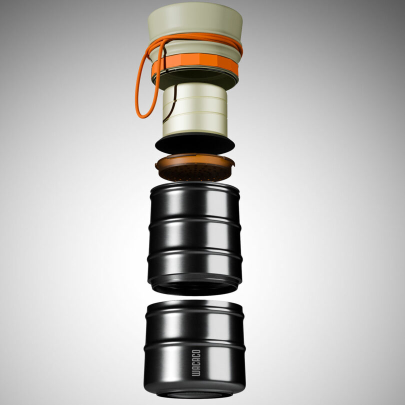 Exploded view of the MokaMax showing the filter, lid, and internal compartments.