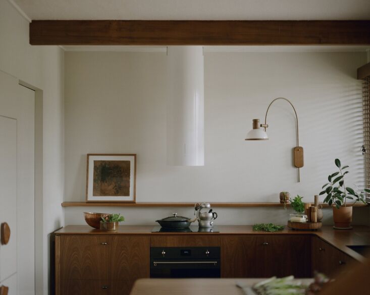 Close-up of the kitchen's custom spotted gum wood cabinets and countertops.