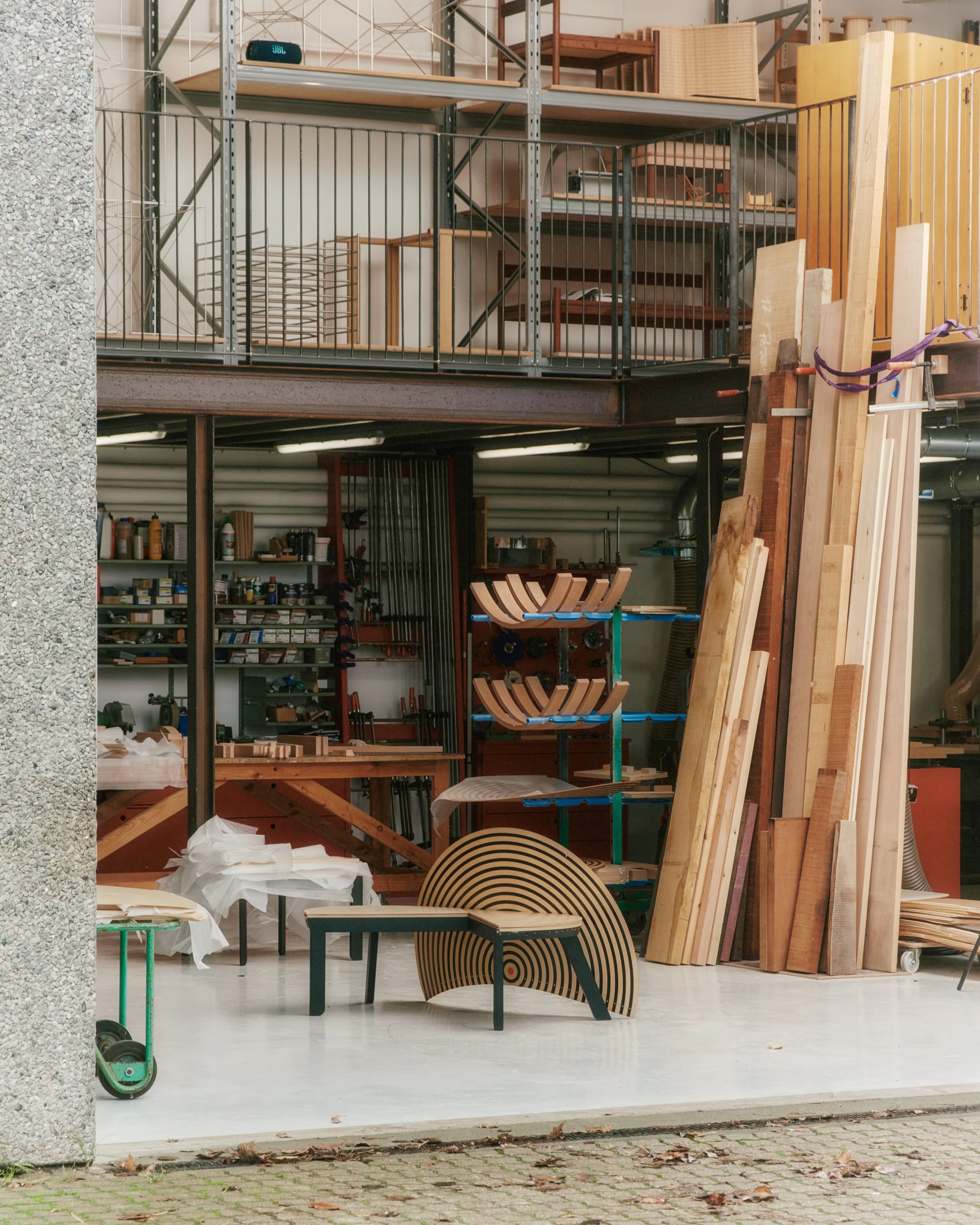 Close-up detail of the aircraft-grade maple veneer and the screen-printed dot motif.