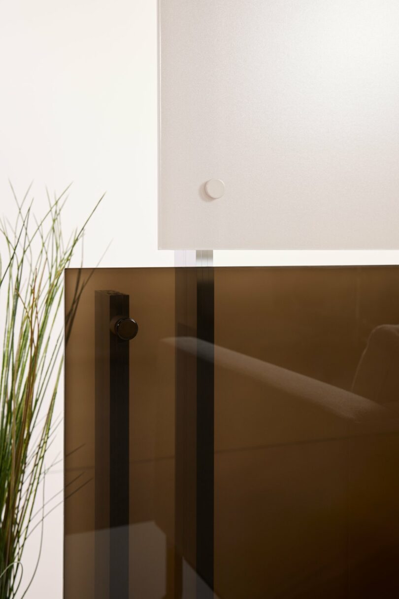 A healthcare facility corridor featuring calming green 3form dividers.