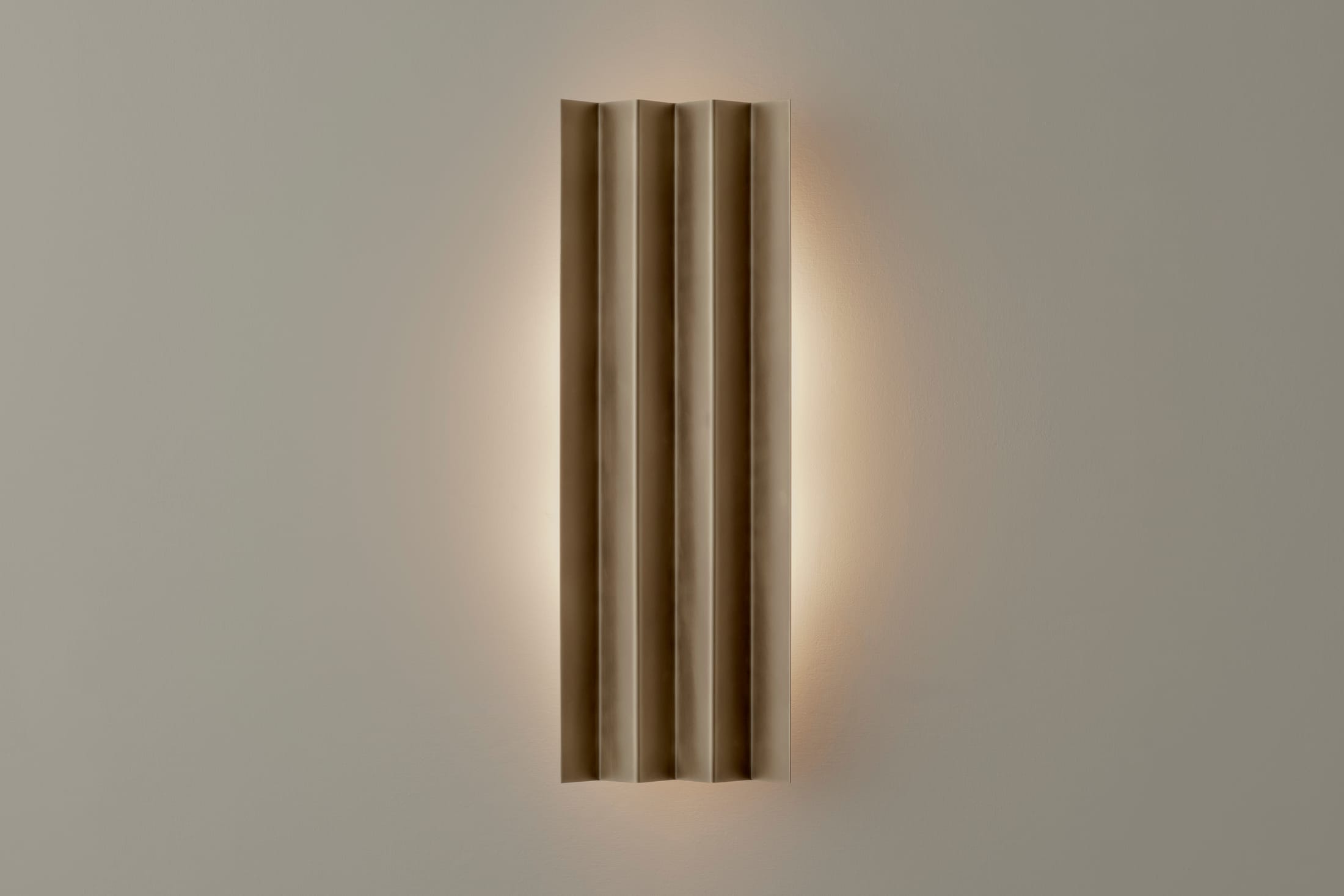 Interior view showing the integration of sculptural lighting in a contemporary setting.